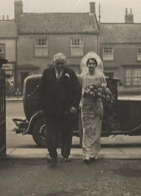 Grandad Robinson escorting Laura Weighell (Aunty Laura) on her wedding day